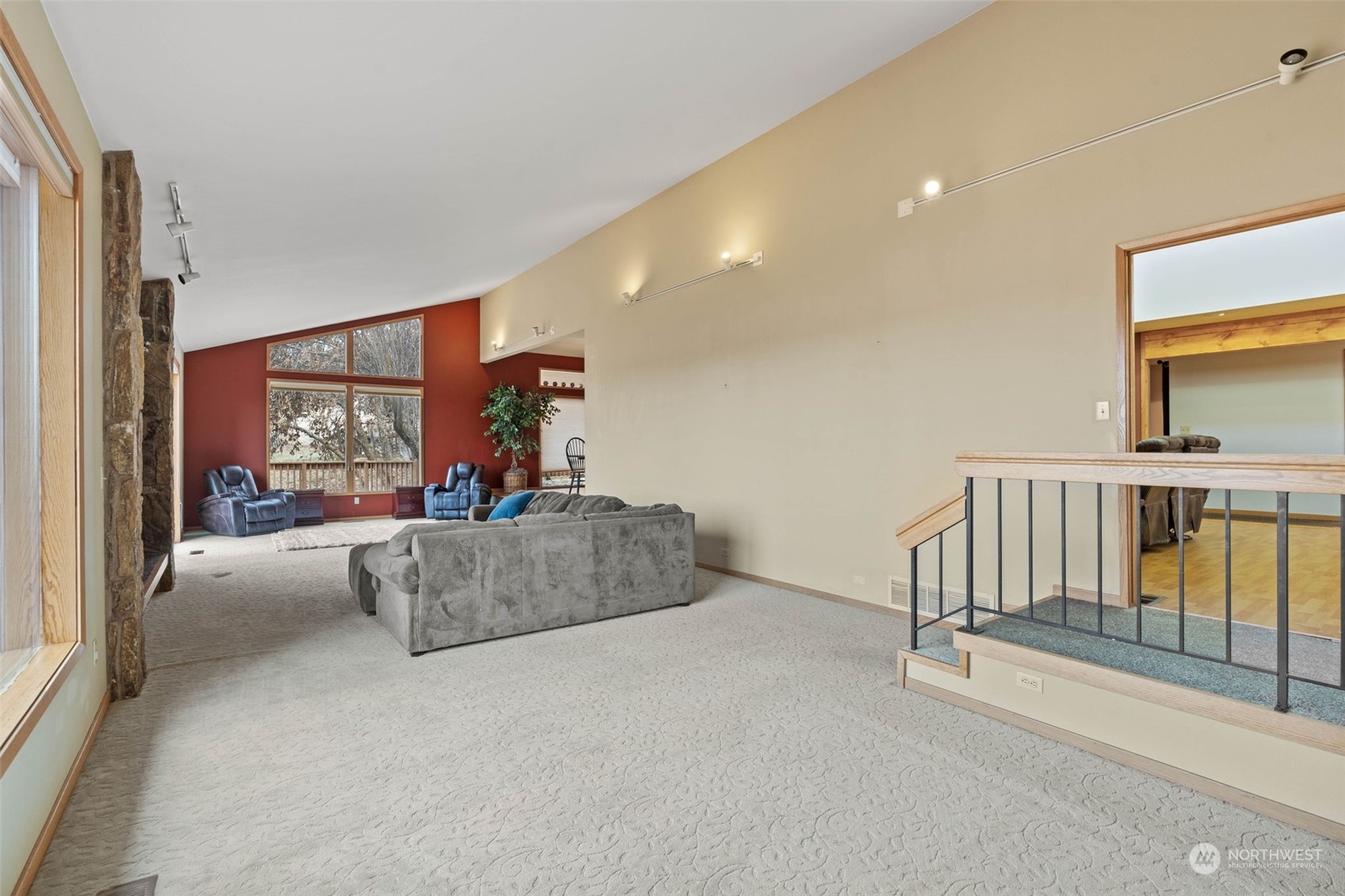 4209 South Eastern Road Spokane, WA 99223 - Photo 6 of 40 a living room with furniture and a flat screen tv