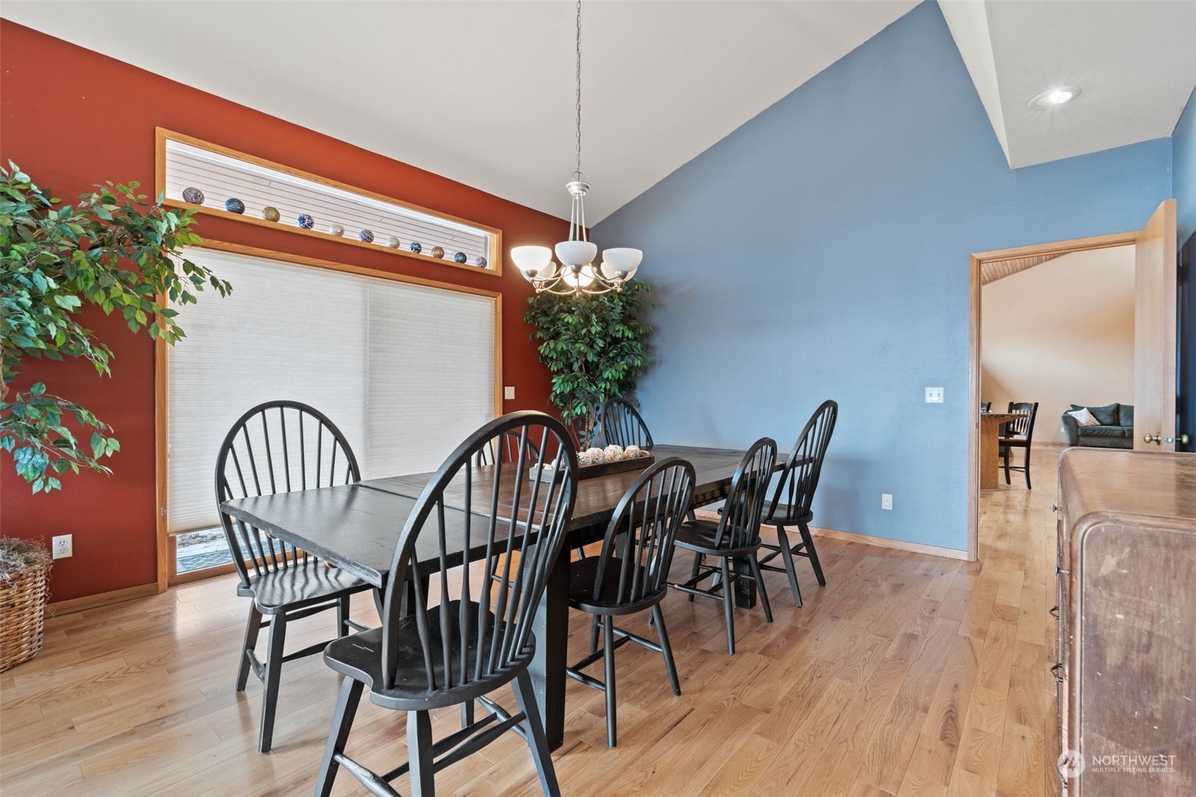 4209 South Eastern Road Spokane, WA 99223 - Photo 8 of 40 a dining room with furniture and wooden floor