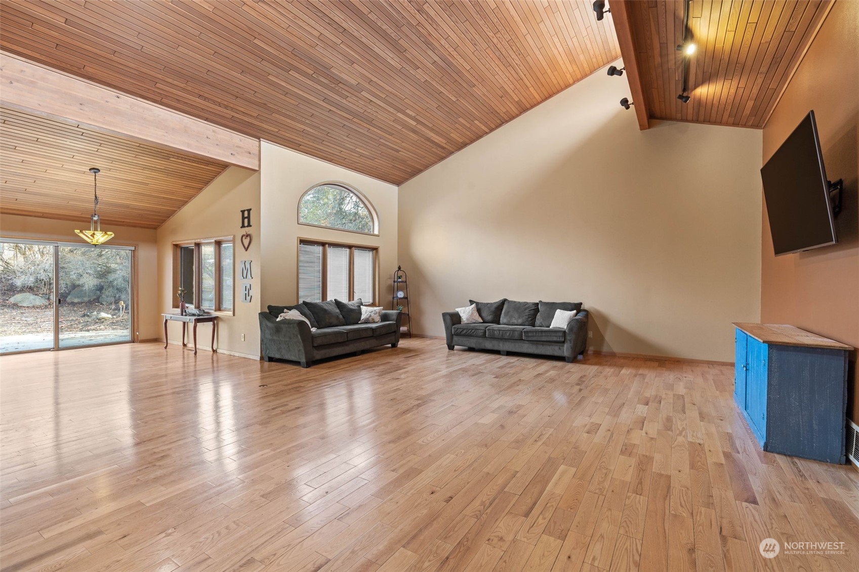 4209 South Eastern Road Spokane, WA 99223 - Photo 9 of 40 a living room with furniture and a flat screen tv