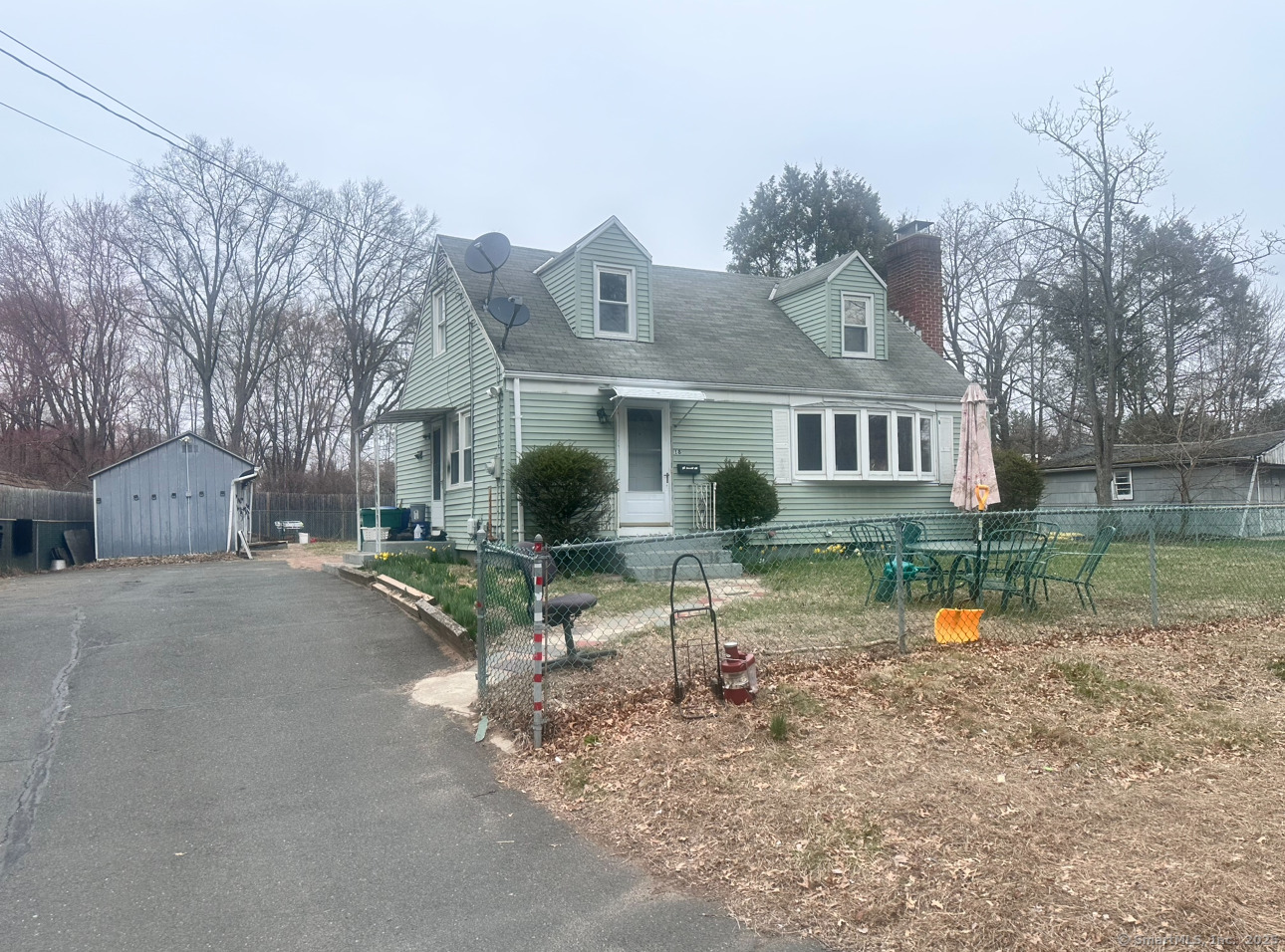 18 Walsh Street Bloomfield, CT 06002 - Photo 1 of 1 a front view of a house with garden