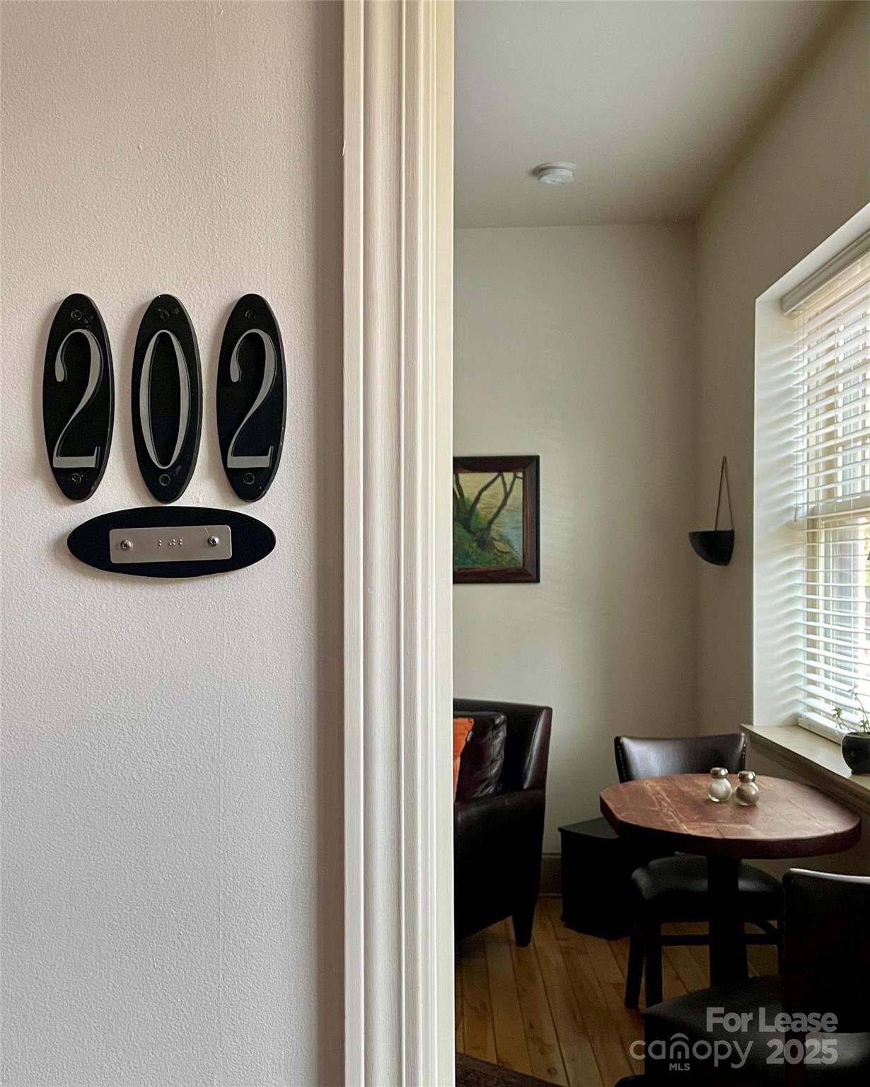 5 West Walnut Street, Unit 202 Asheville, NC 28801 - Photo 3 of 14 a view of a room that has a table and chairs