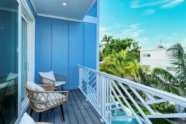 a kitchen with stainless steel appliances granite countertop a sink a stove and cabinets