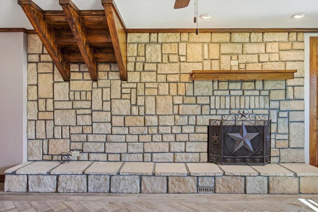 424 Edwards Drive Dublin, TX 76446 - Photo 13 of 40 Detailed view of a stone fireplace