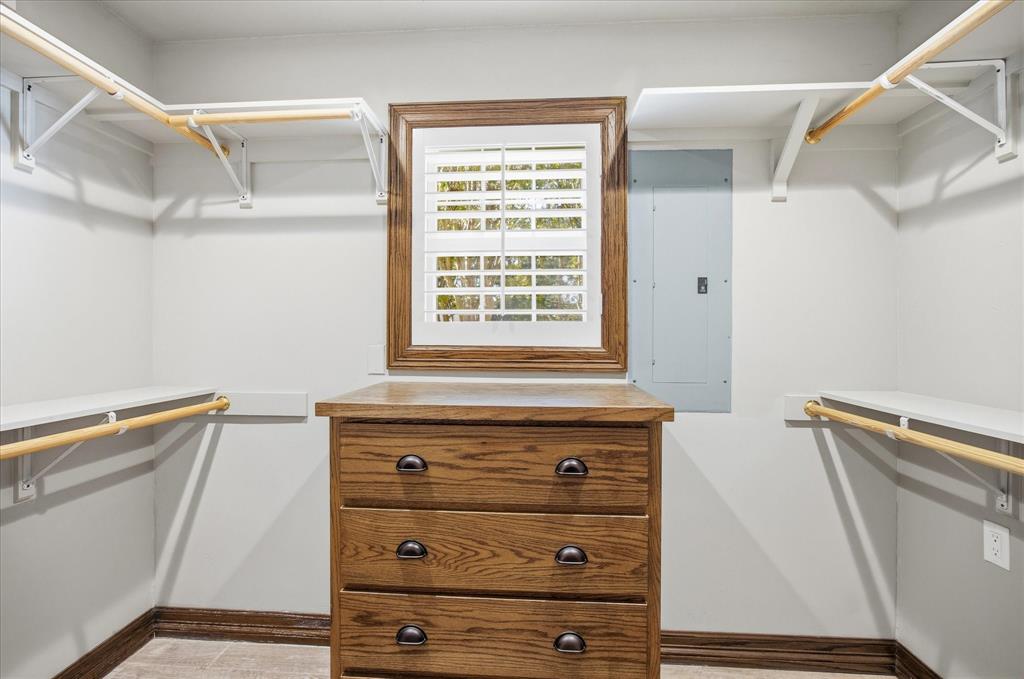 424 Edwards Drive Dublin, TX 76446 - Photo 20 of 40 a view of walk in closet with empty racks