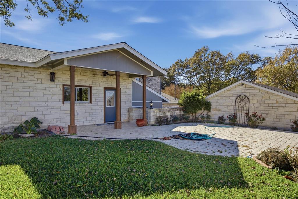 424 Edwards Drive Dublin, TX 76446 - Photo 30 of 40 a view of a house with a yard