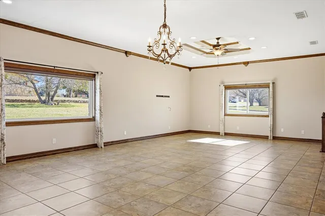 a view of a livingroom with furniture and staircase