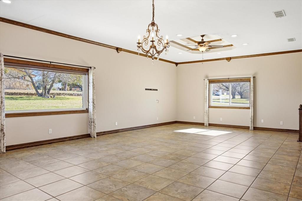 424 Edwards Drive Dublin, TX 76446 - Photo 7 of 40 a view of an empty room with a window
