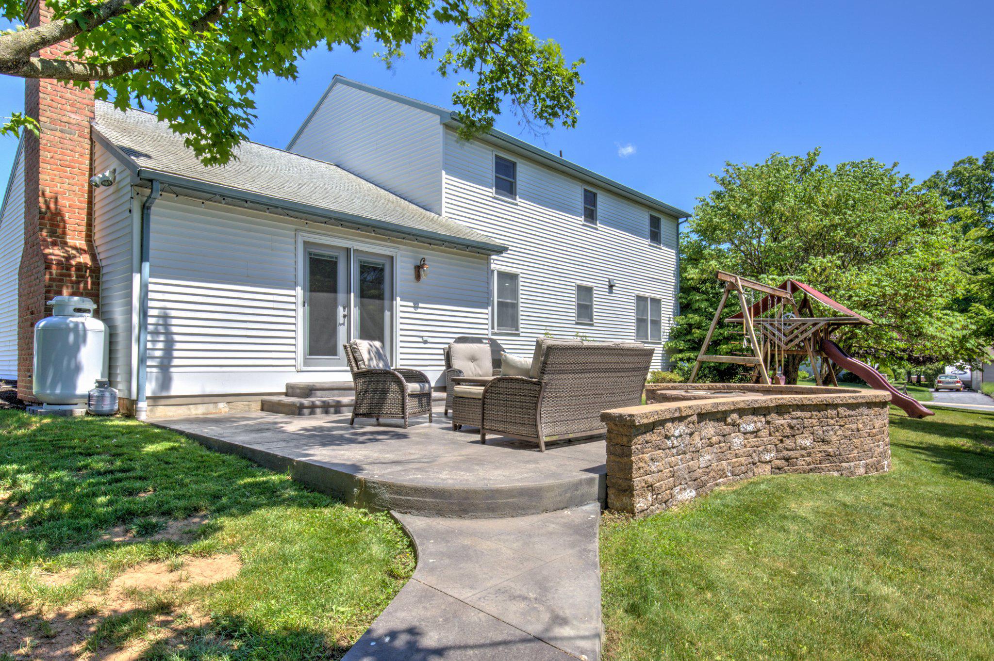 2 Mockingbird Drive Denver, PA 17517 - Photo 6 of 39 Stamped concrete patio with built in fire pit