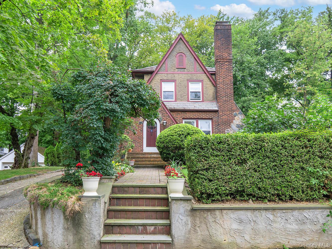 6 4th Road Great Neck, NY 11021 - Photo 1 of 1 View of front of home featuring brick siding and a chimney