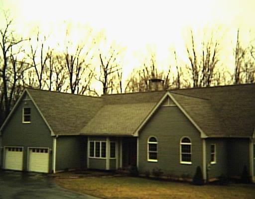 14 Cricklewood Road Redding, CT 06896 - Photo 1 of 1 a front view of a house with a yard