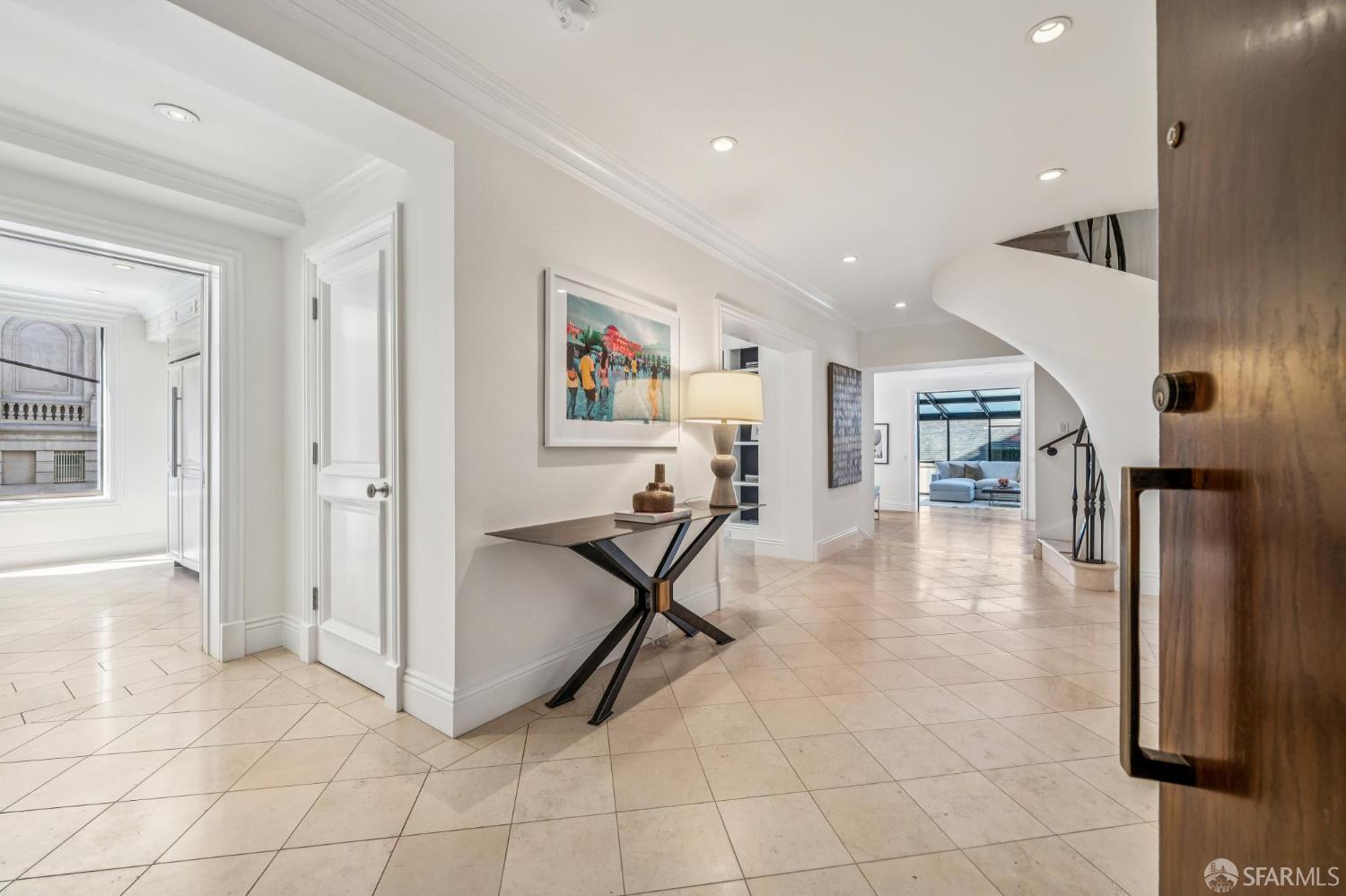 2190 Broadway, Unit 1W San Francisco, CA 94115 - Photo 1 of 66 a view of a livingroom with furniture and stairs