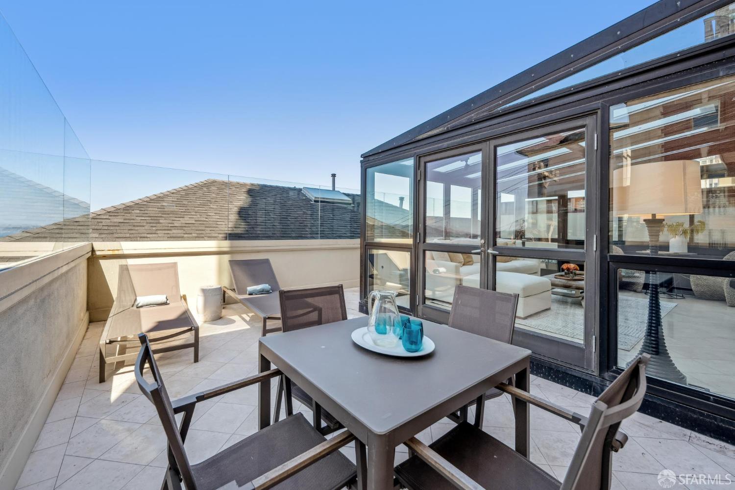 2190 Broadway, Unit 1W San Francisco, CA 94115 - Photo 17 of 66 a view of a dining room with furniture and window