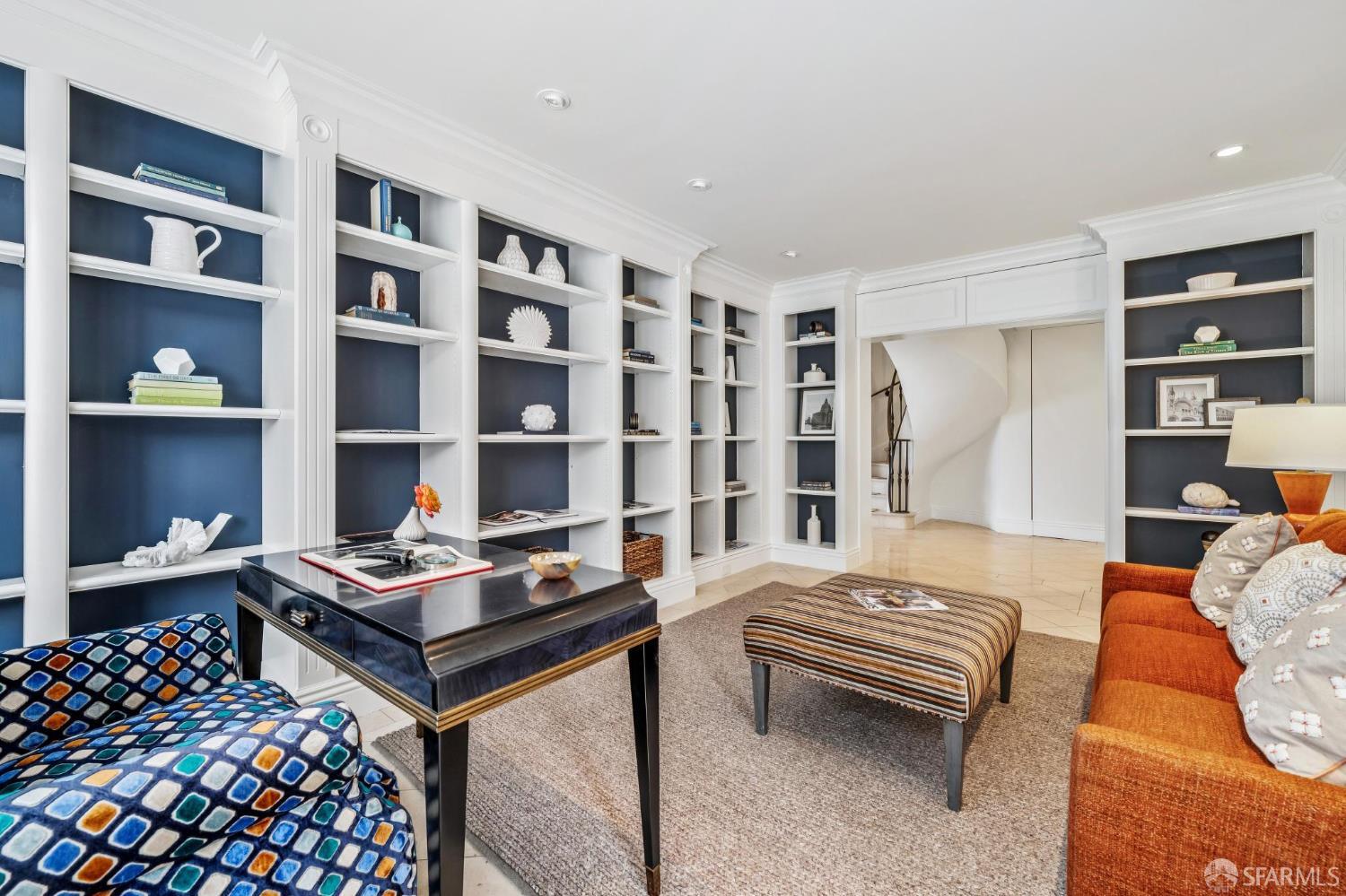 2190 Broadway, Unit 1W San Francisco, CA 94115 - Photo 20 of 66 a bedroom with furniture and a book shelf