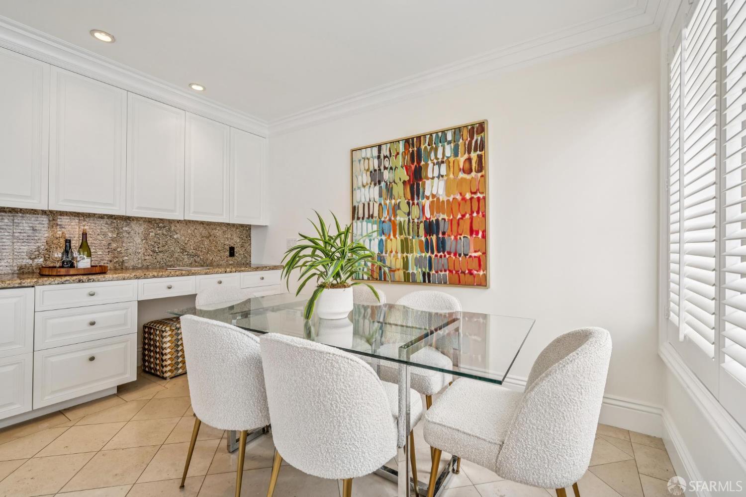 2190 Broadway, Unit 1W San Francisco, CA 94115 - Photo 27 of 66 a living room with furniture a window and a potted plant