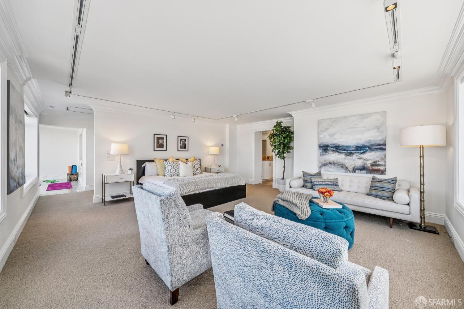 2190 Broadway, Unit 1W San Francisco, CA 94115 - Photo 33 of 66 a living room with furniture and a flat screen tv