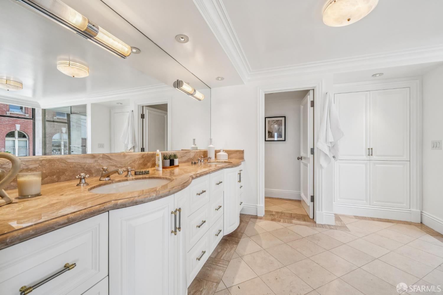 2190 Broadway, Unit 1W San Francisco, CA 94115 - Photo 42 of 66 a spacious bathroom with a double vanity sink mirror and