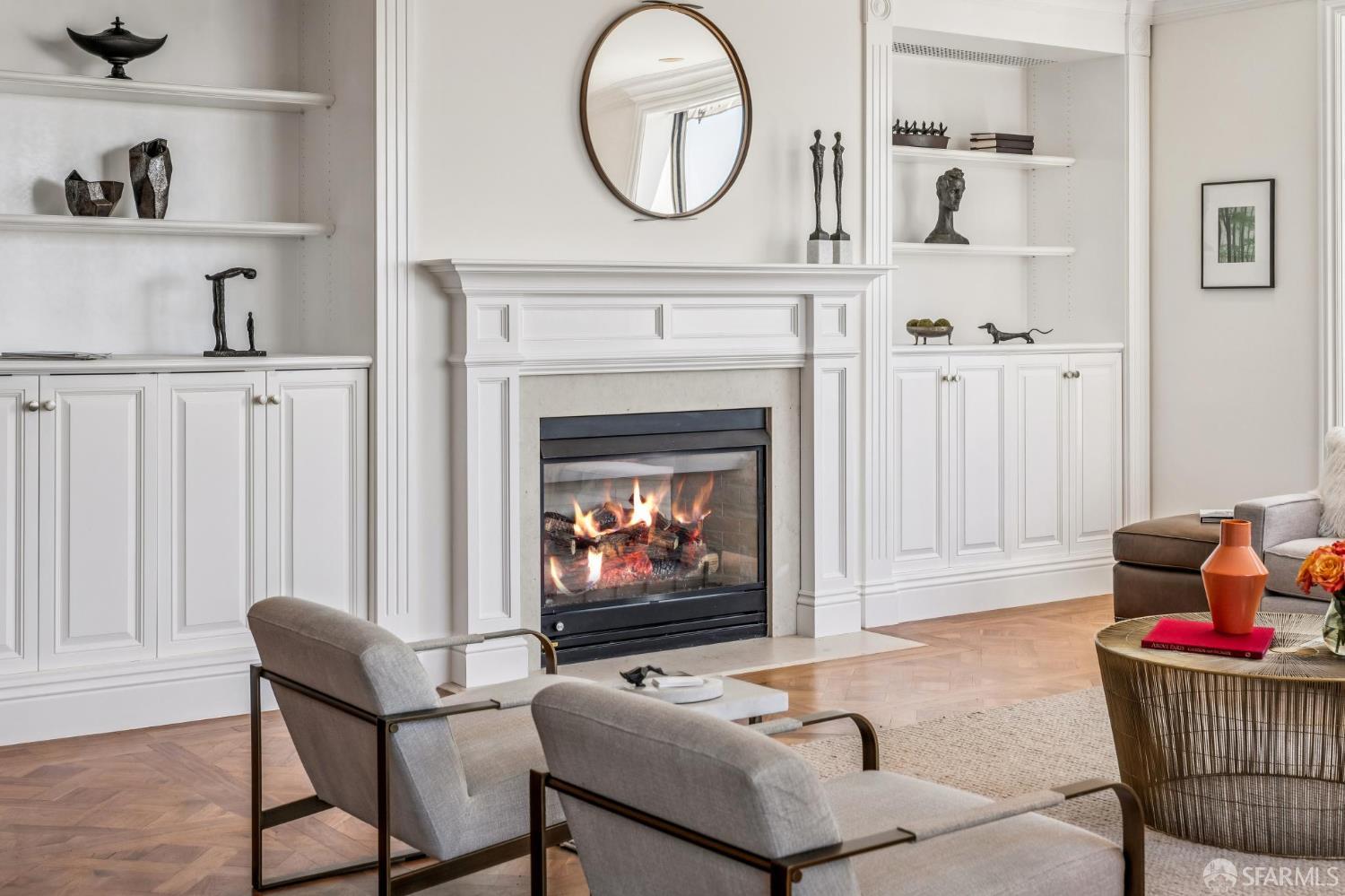 2190 Broadway, Unit 1W San Francisco, CA 94115 - Photo 8 of 66 a living room with furniture a flat screen tv and a fireplace