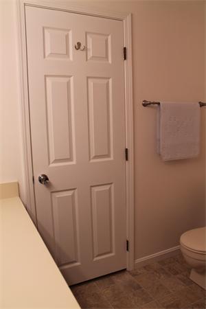 133 Patrick Road, Unit 133 Tewksbury, MA 01876 - Photo 20 of 30 a bathroom with a toilet