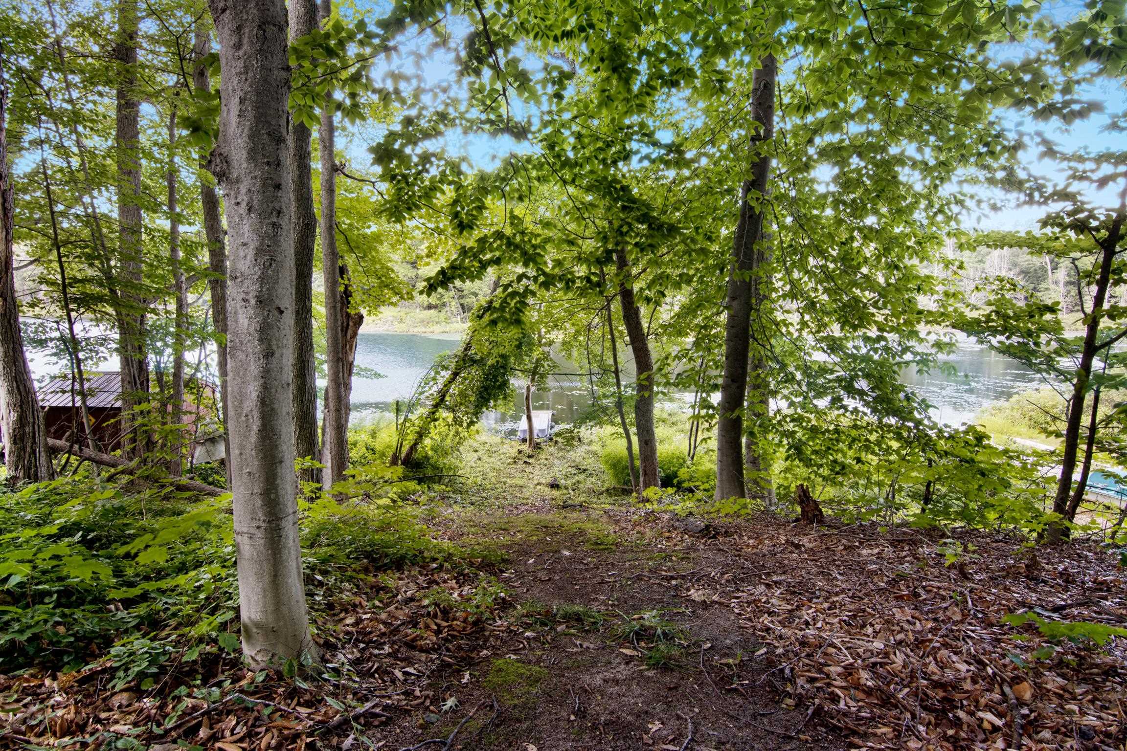 7668 Forest Lodge Road Traverse City, MI 49685 - Photo 3 of 30 1938134-034b6c7d-1ba4-45c9-8221-76306ea6df25.JPG