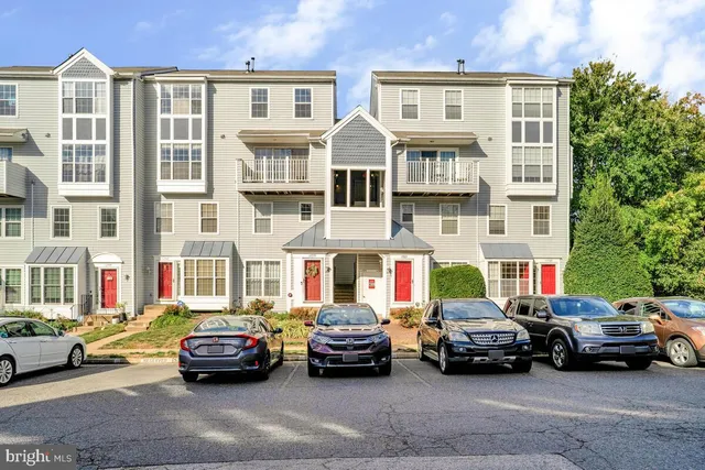 a car parked in front of a buildings