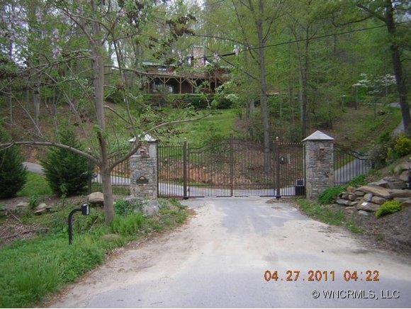 17 Waterfall Valley, Unit 17 Waynesville, NC 28785 - Photo 1 of 1 a backyard of a house with lots of green space