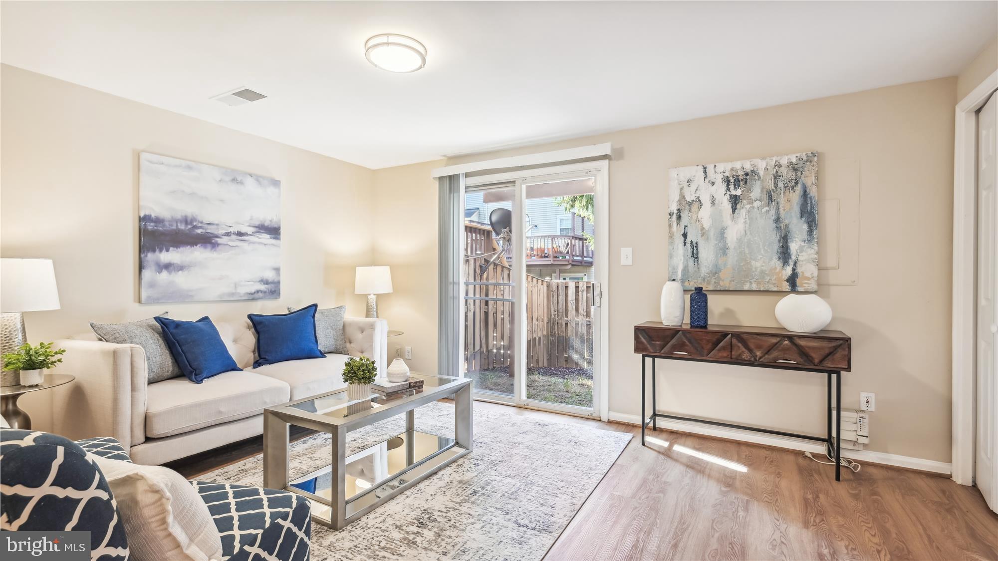 22053 Manning Square Sterling, VA 20166 - Photo 23 of 36 Family Room on Lower Level with Access to Backyard