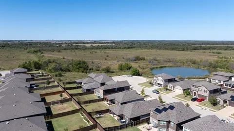an aerial view of a terrace with outdoor seating