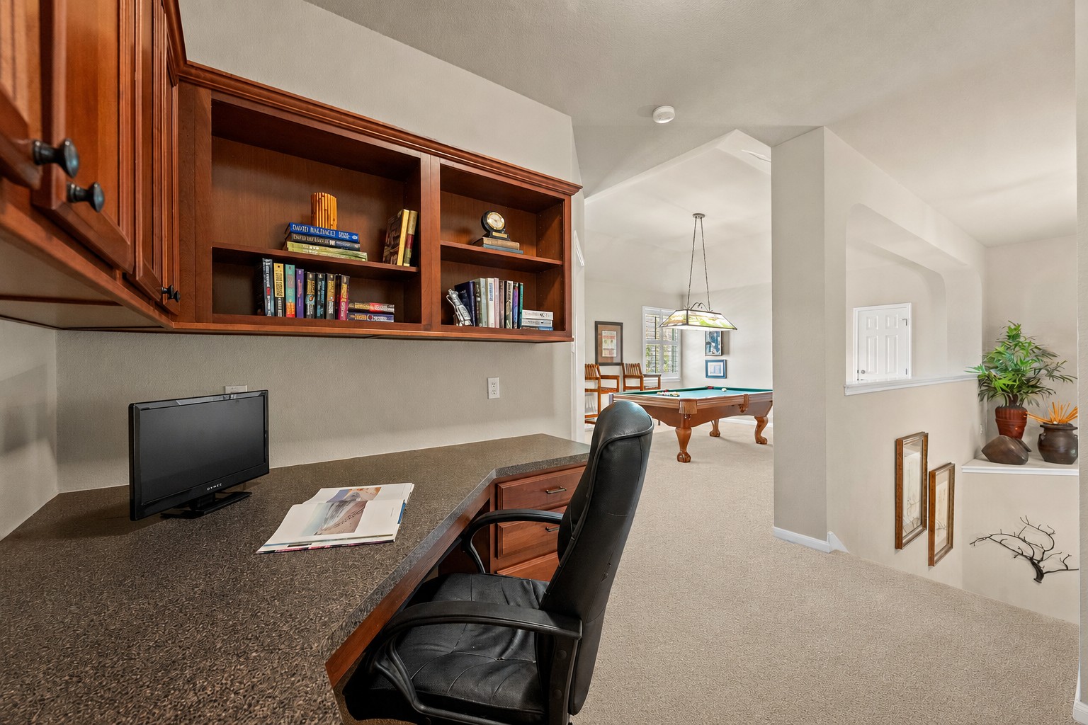 14608 Spillman Ranch Loop Austin, TX 78738 - Photo 22 of 31 a view of a workspace with furniture