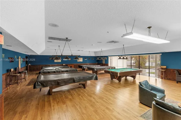 a living room filled with furniture and a table
