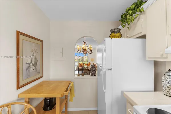 a room with a table and chairs