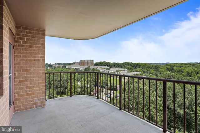 wooden floor and a window in an empty room