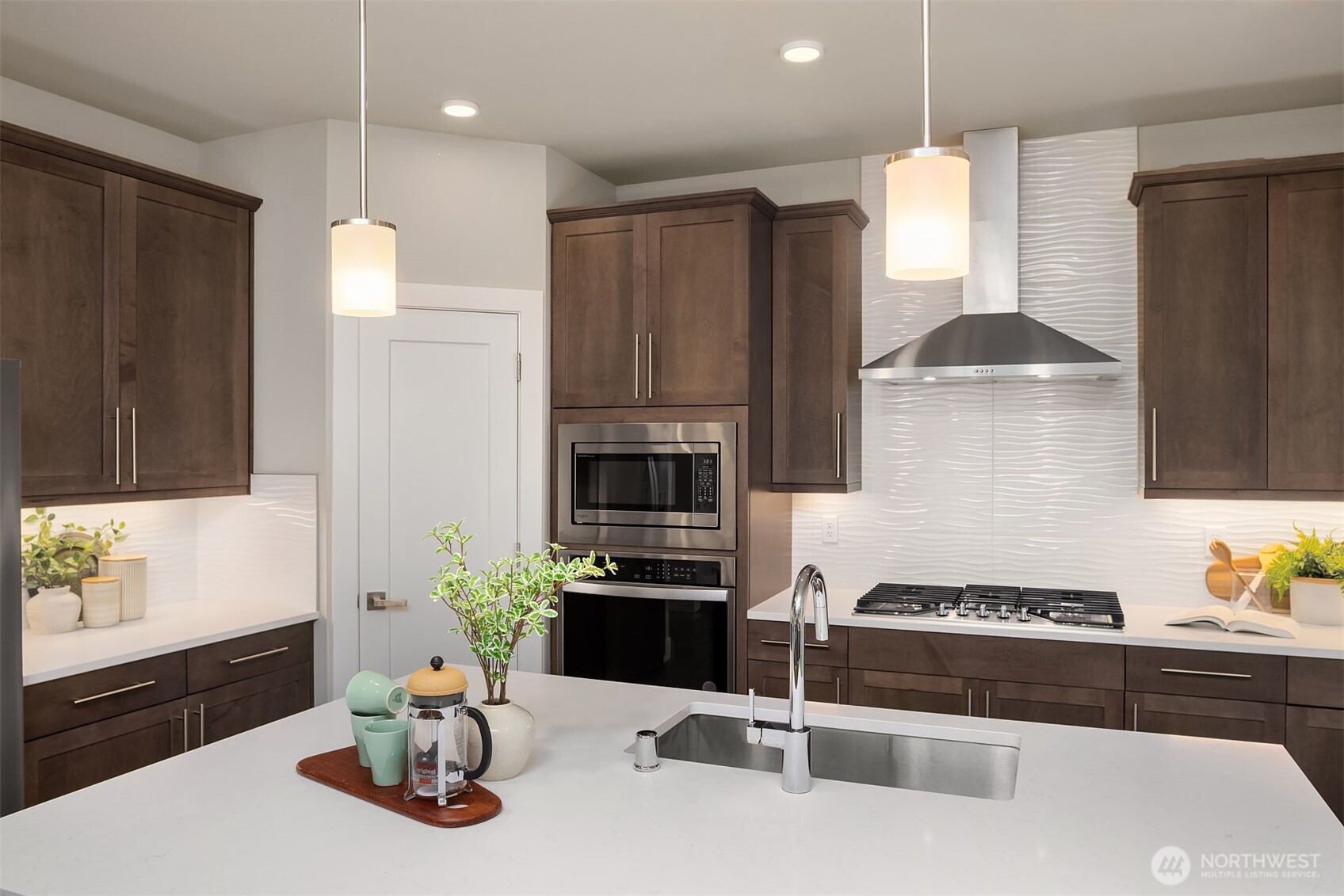 2015 228th Place Southwest Bothell, WA 98021 - Photo 16 of 40 a kitchen with a sink and stove