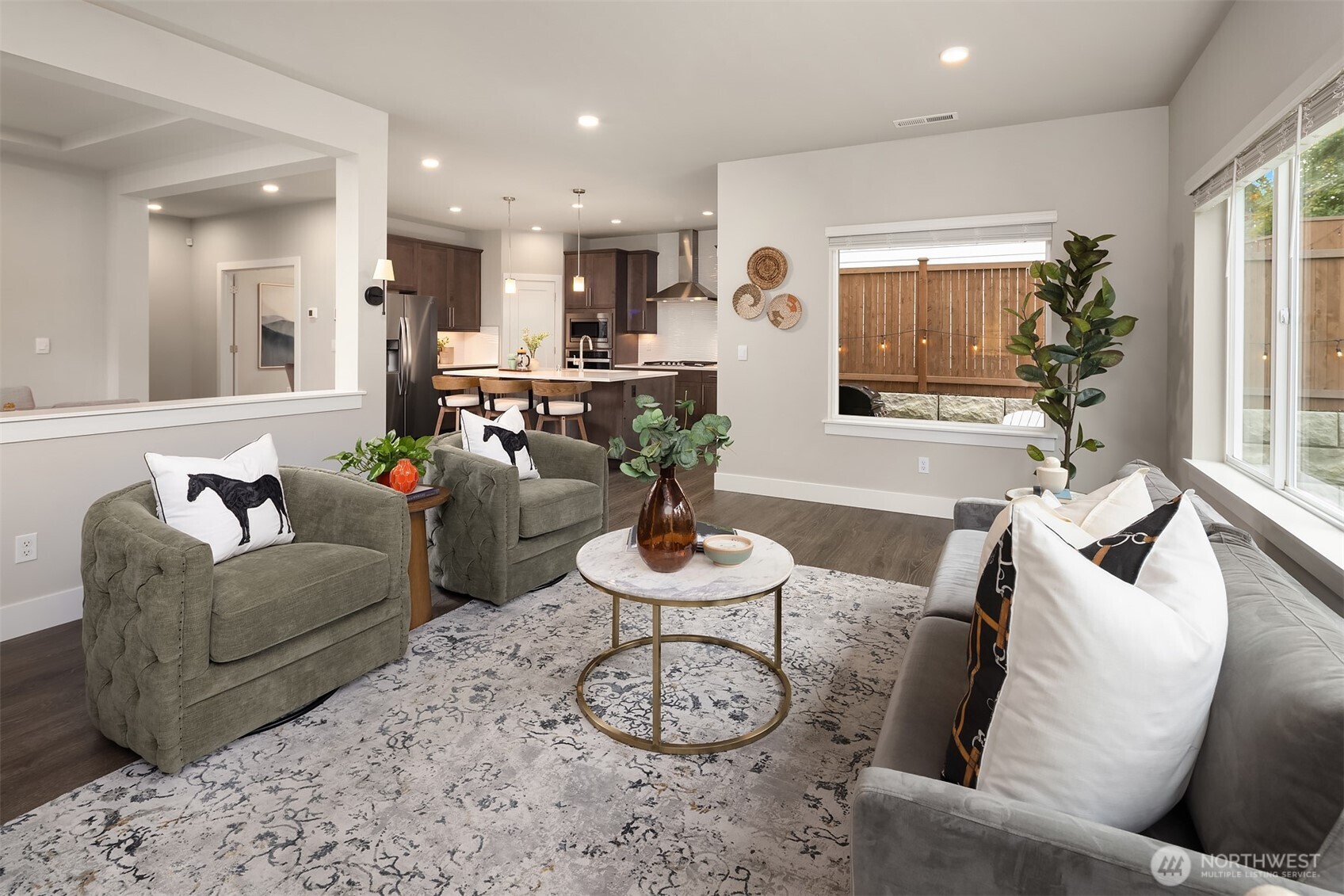 2015 228th Place Southwest Bothell, WA 98021 - Photo 19 of 40 a living room with furniture potted plant and windows