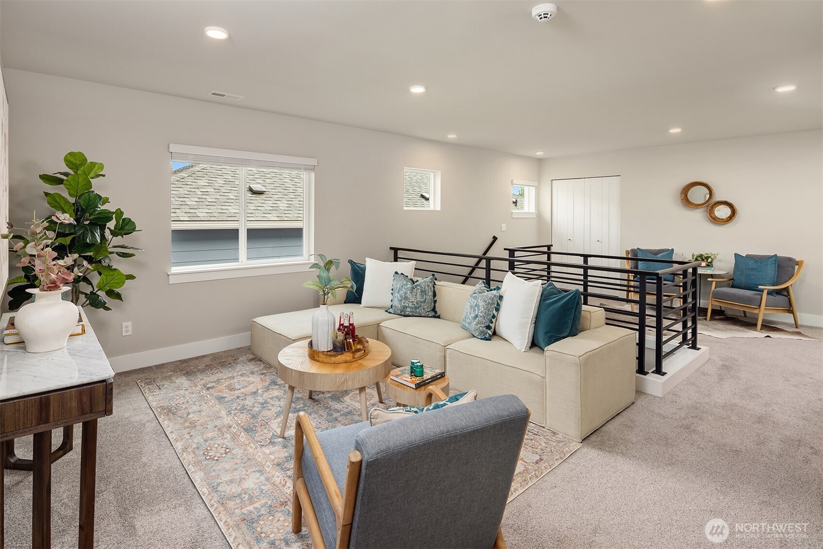 2015 228th Place Southwest Bothell, WA 98021 - Photo 22 of 40 a living room with furniture and a potted plant