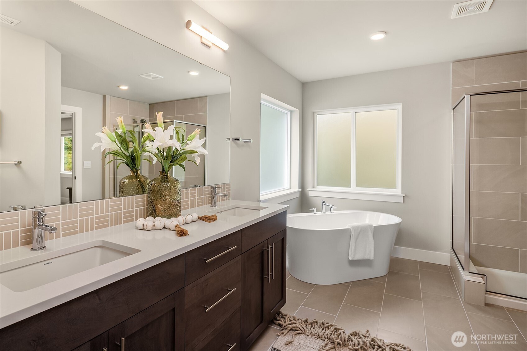 2015 228th Place Southwest Bothell, WA 98021 - Photo 26 of 40 a bathroom with a double vanity sink mirror and double