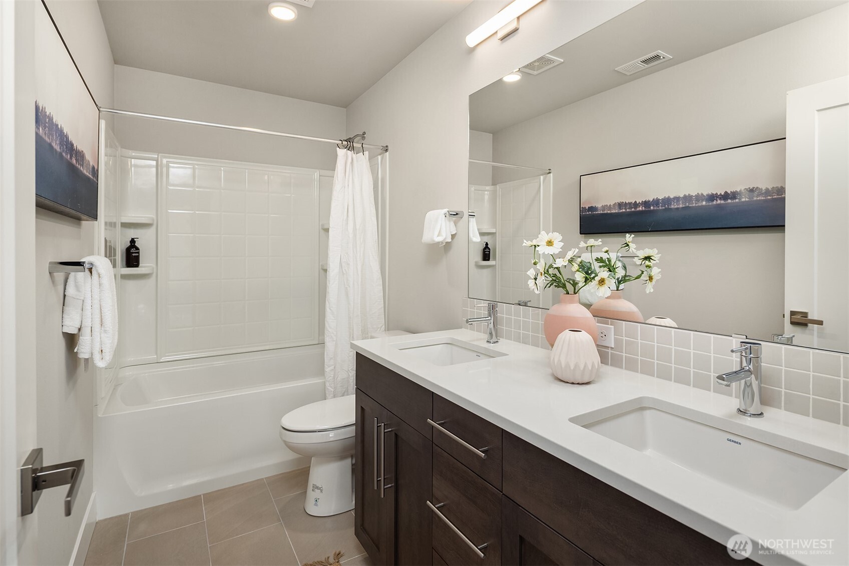 2015 228th Place Southwest Bothell, WA 98021 - Photo 28 of 40 a bathroom with a double vanity sink toilet and shower
