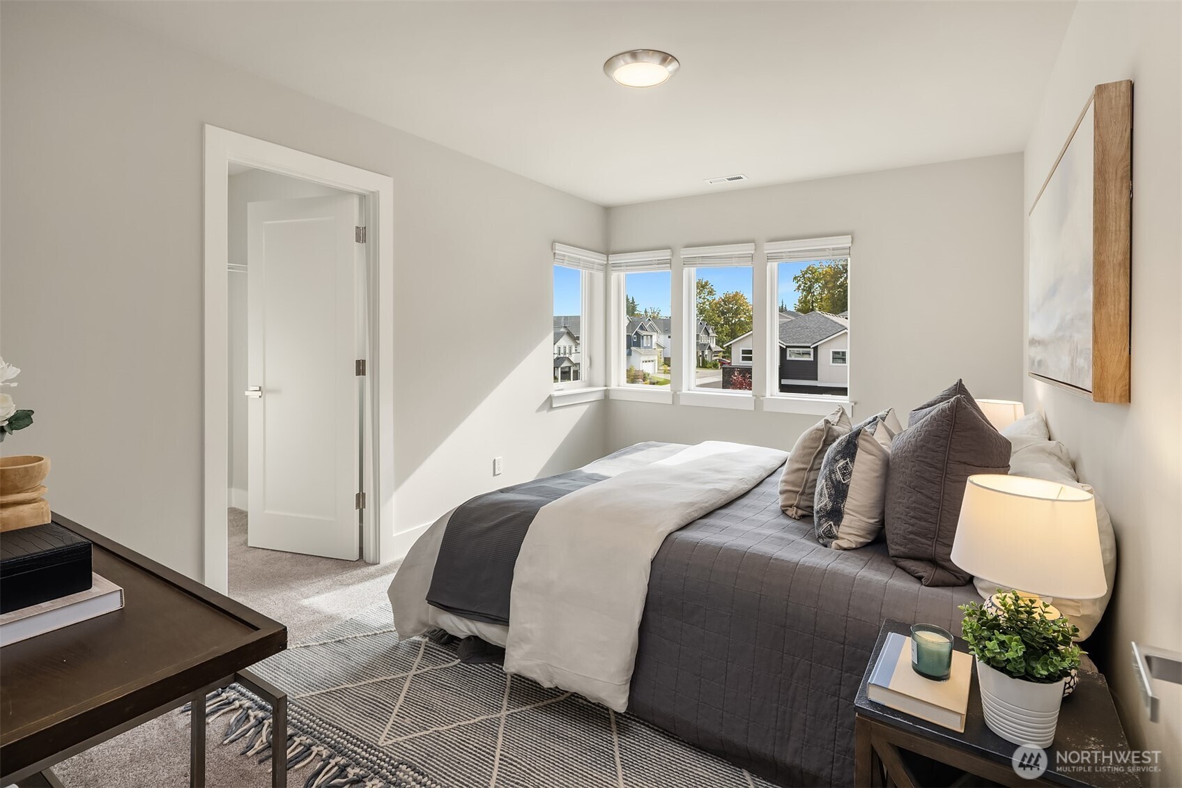 2015 228th Place Southwest Bothell, WA 98021 - Photo 29 of 40 a bedroom with a bed and window