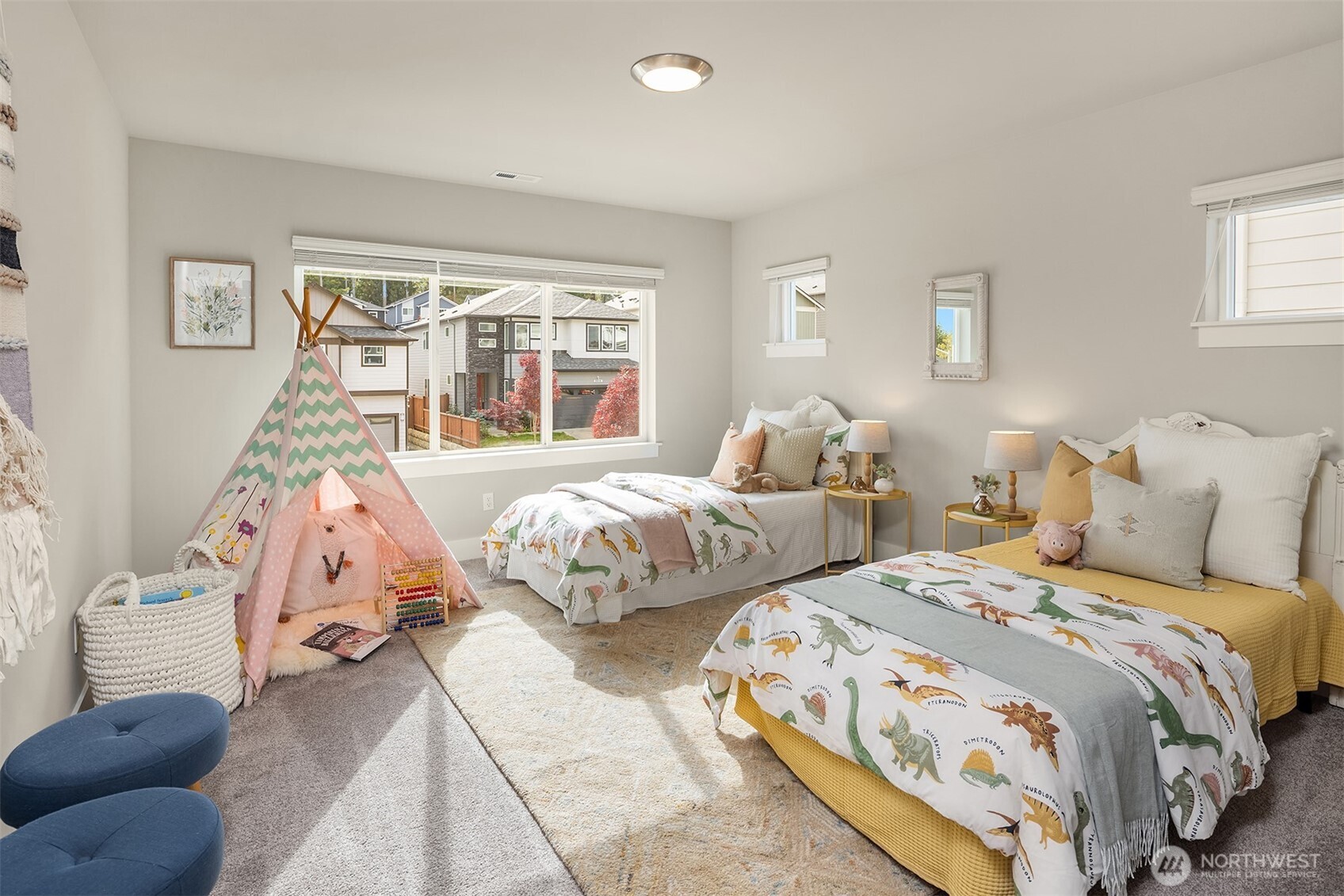 2015 228th Place Southwest Bothell, WA 98021 - Photo 30 of 40 a bedroom with two beds and a window