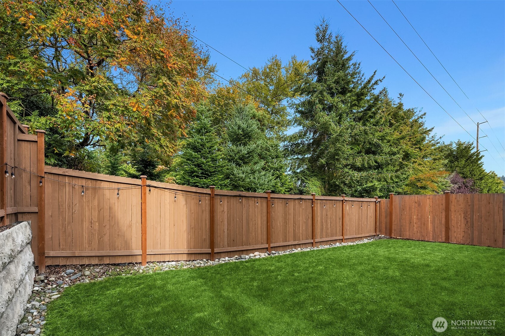 2015 228th Place Southwest Bothell, WA 98021 - Photo 33 of 40 a view of a backyard with wooden fence