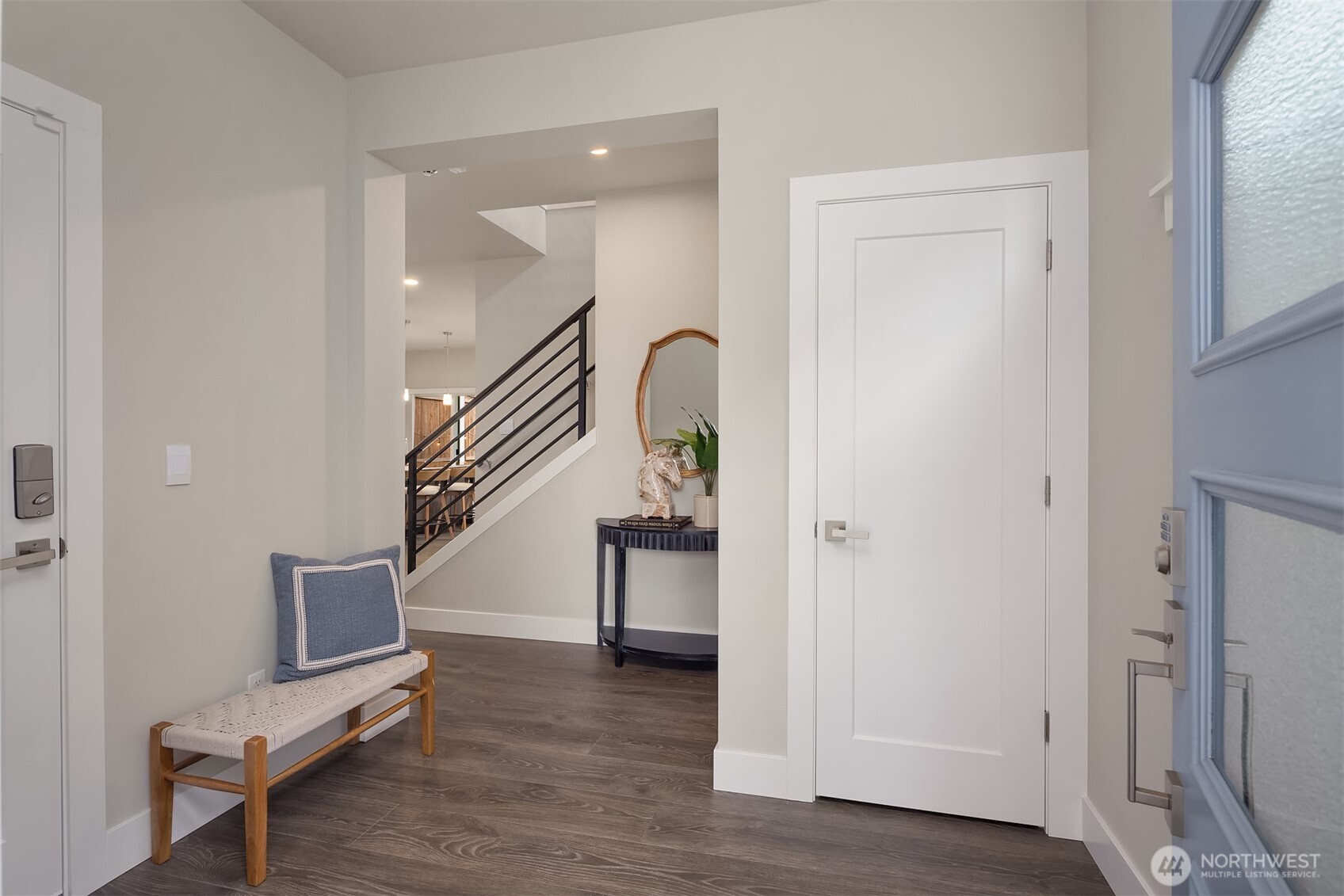 2015 228th Place Southwest Bothell, WA 98021 - Photo 6 of 40 a view of a hallway with wooden floor and stairs