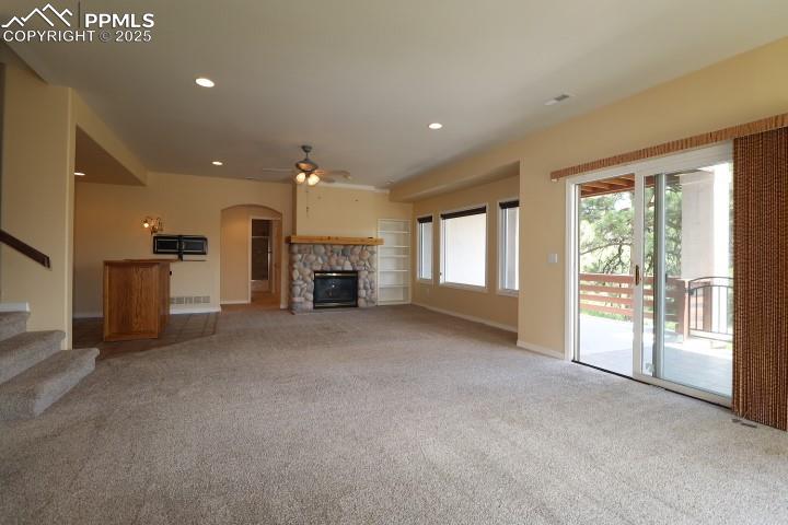 4015 Ramshorn Point Colorado Springs, CO 80904 - Photo 24 of 44 a view of an empty room with a fireplace