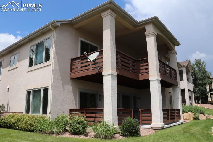 4015 Ramshorn Point Colorado Springs, CO 80904 - Photo 39 of 44 a front view of a house with garden