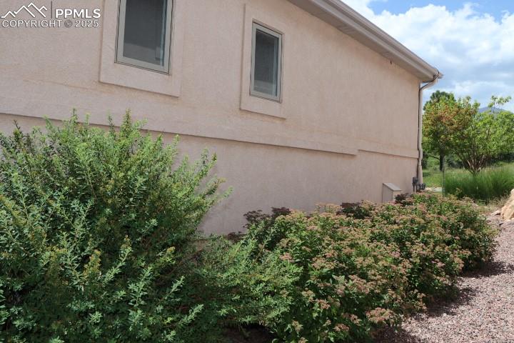 4015 Ramshorn Point Colorado Springs, CO 80904 - Photo 42 of 44 a backyard of a house with lots of green space
