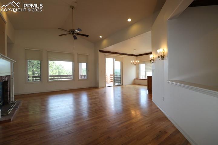 4015 Ramshorn Point Colorado Springs, CO 80904 - Photo 8 of 44 wooden floor in an empty room with a window