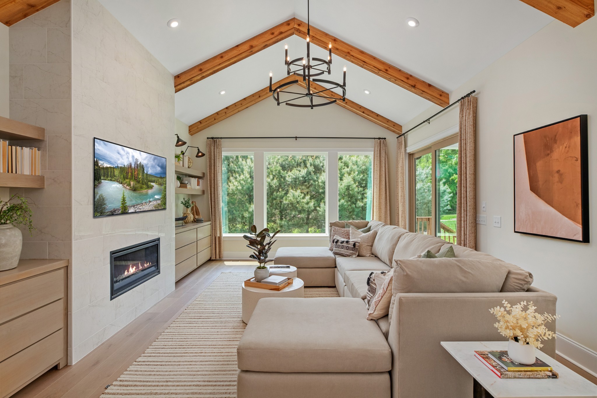 5805 Brees Place Arrington, TN 37014 - Photo 29 of 83 a living room with furniture a flat screen tv and a fireplace