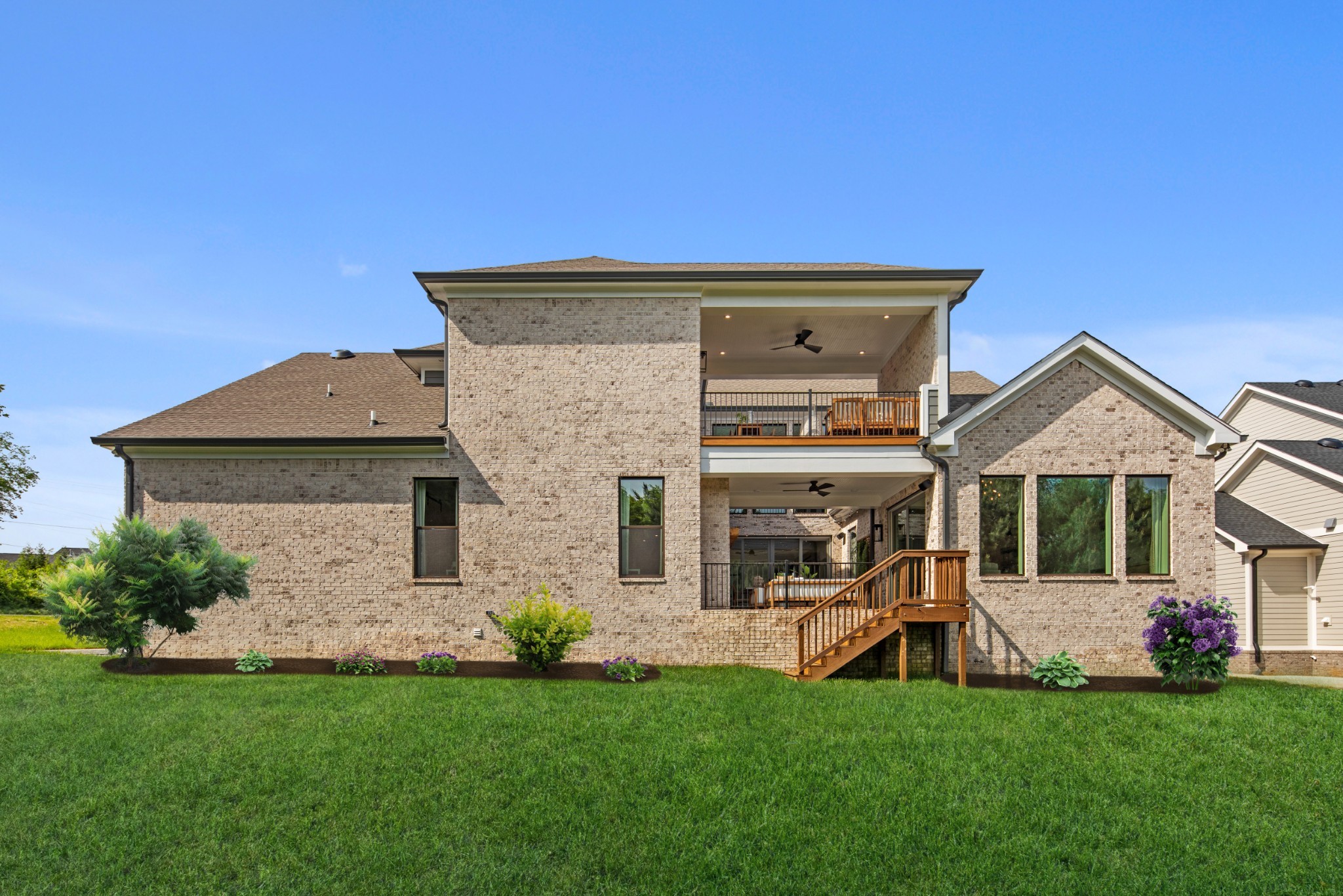 5805 Brees Place Arrington, TN 37014 - Photo 80 of 83 a front view of a house with a yard and garage