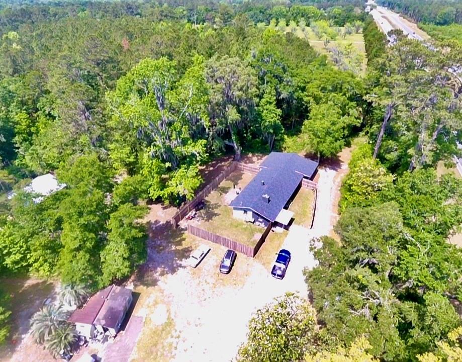 12100 Northwest US Highway 441 Alachua, FL 32615 - Photo 11 of 34 an aerial view of house with yard