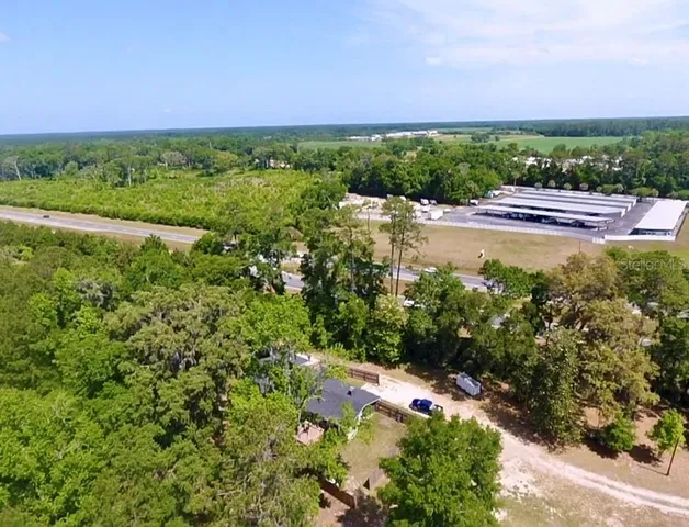 a view of a backyard with a small cabin