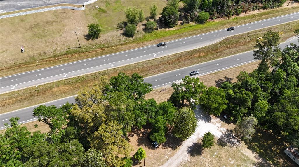 12100 Northwest US Highway 441 Alachua, FL 32615 - Photo 3 of 34 a view of a yard with an outdoor space