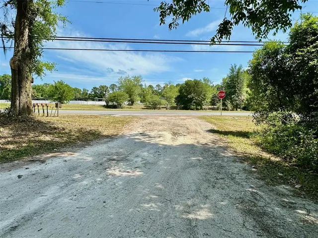 a house with trees in front of it